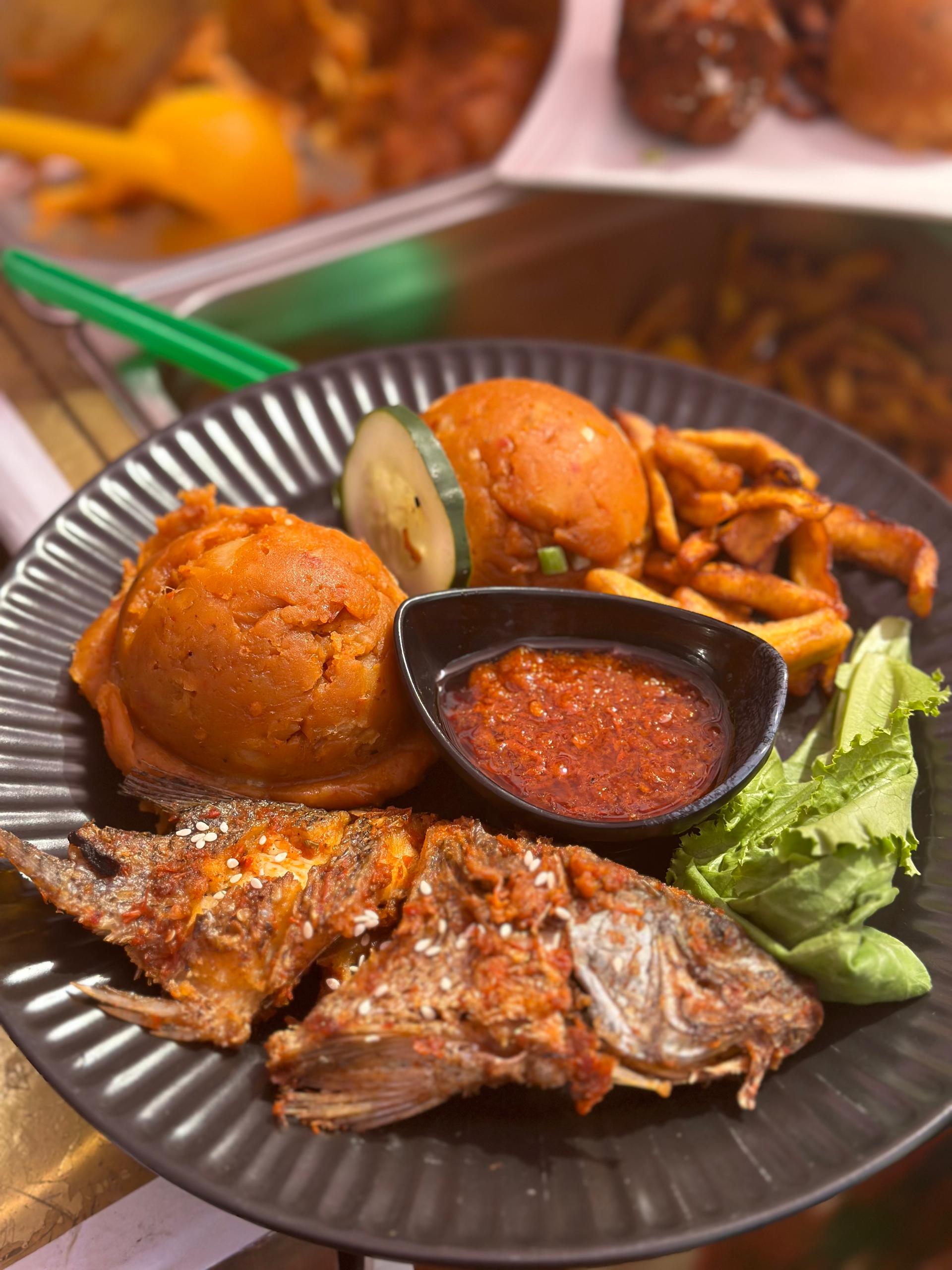 Buttery Porridge, Mackarel & Ponmo Sauce, Plantain, Tillapia Fish and Vegies