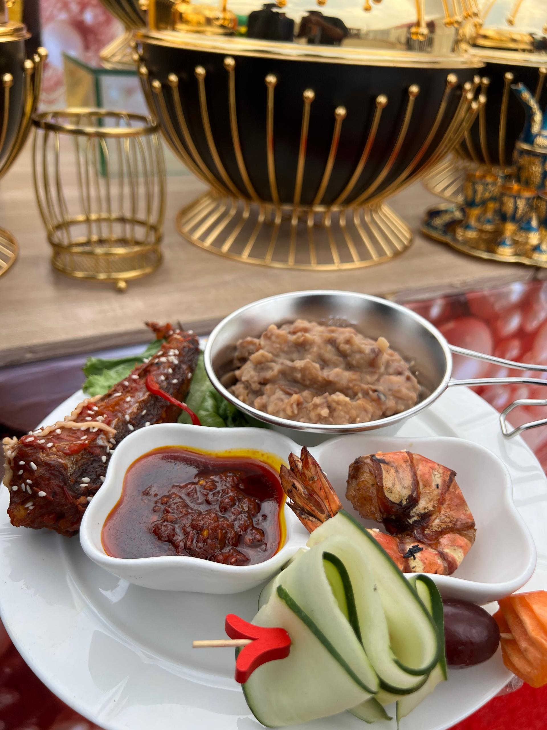 Smashed Beans with Agoyin Sauce, Prawn, Peppered Hake fish and Vegies